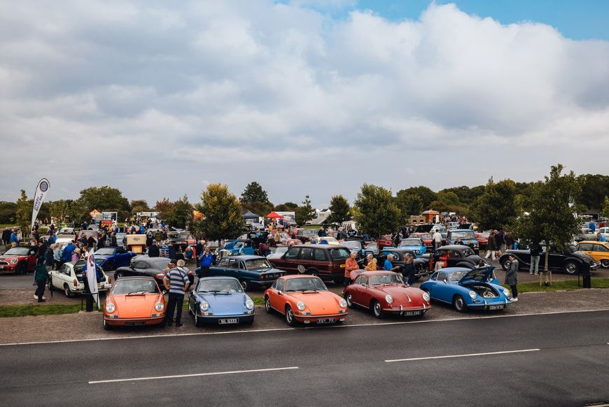 a car park of cars on display